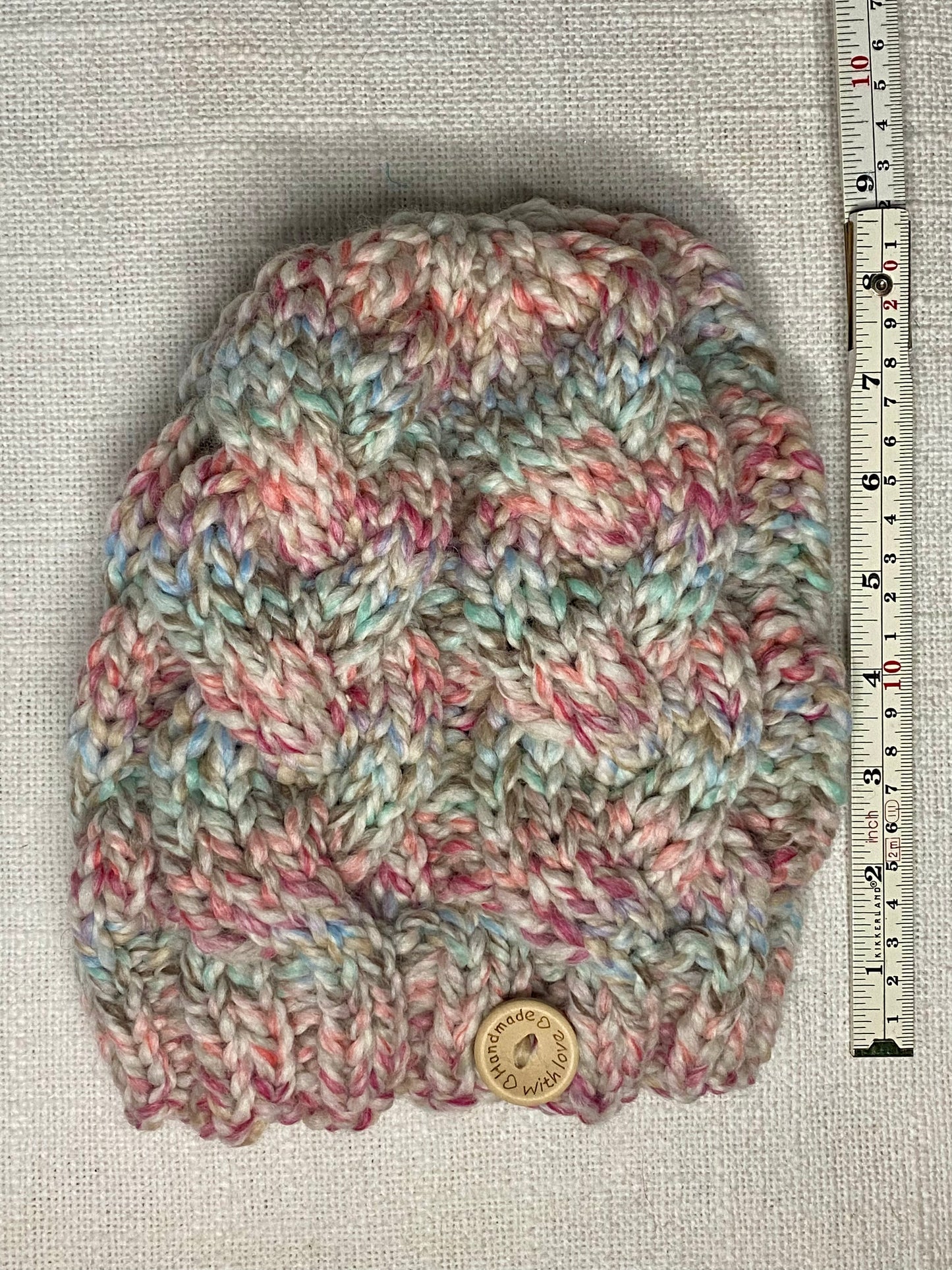 Cozy Cables Hat in Carnival - Wool Blend Fiber