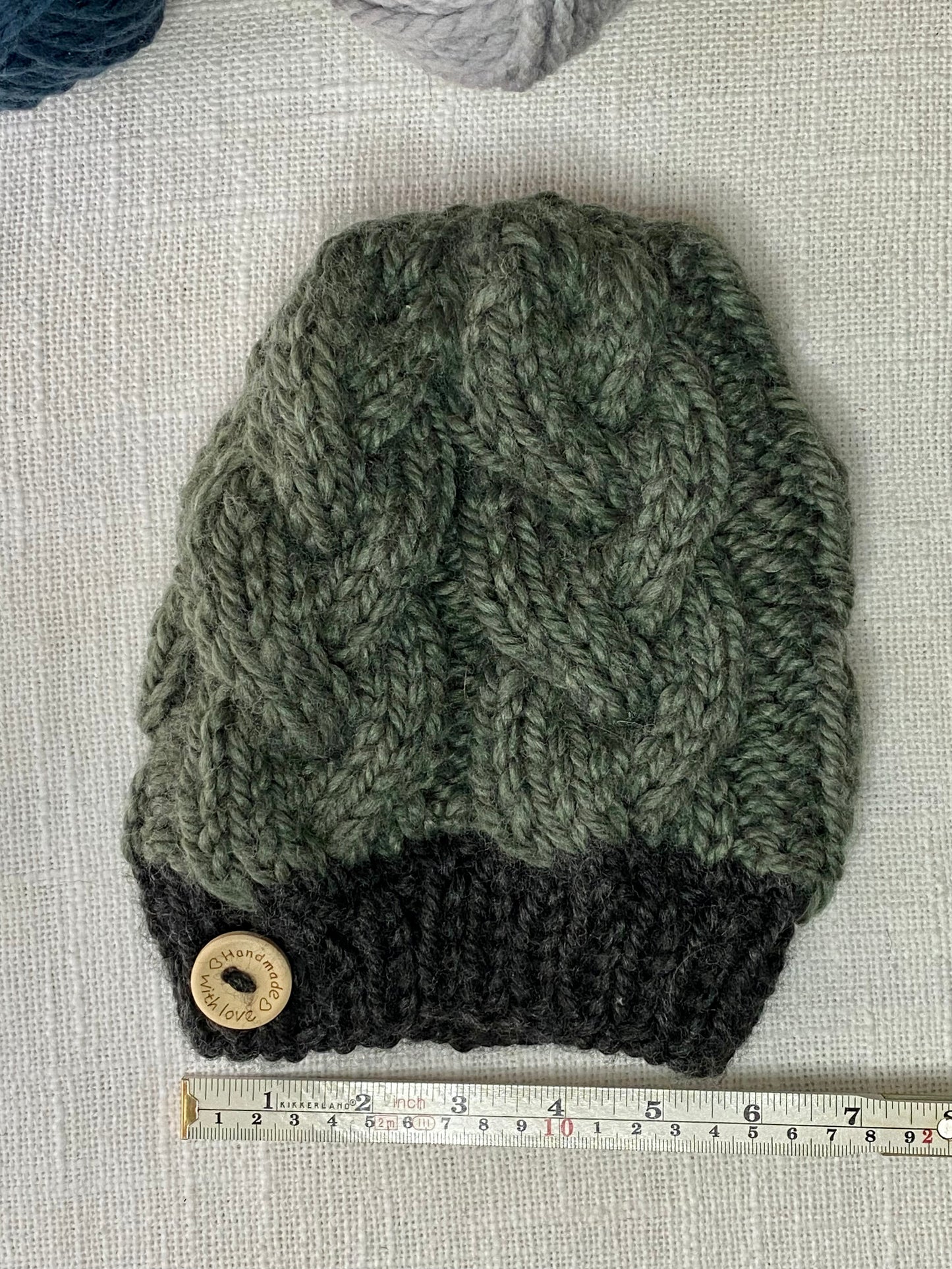 Cozy Cables Hat in Moss and Raven- Recycled Synthetic Fiber be