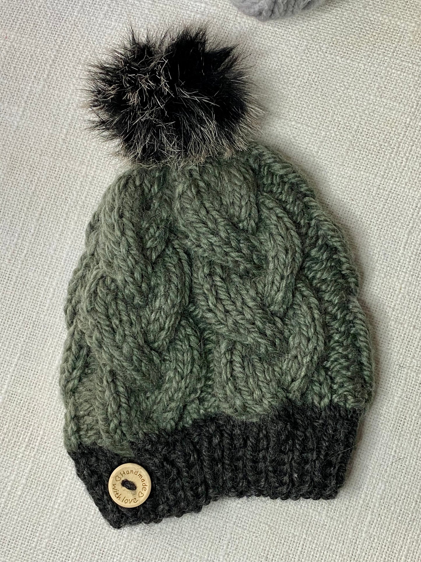 Cozy Cables Hat in Moss and Raven- Recycled Synthetic Fiber be