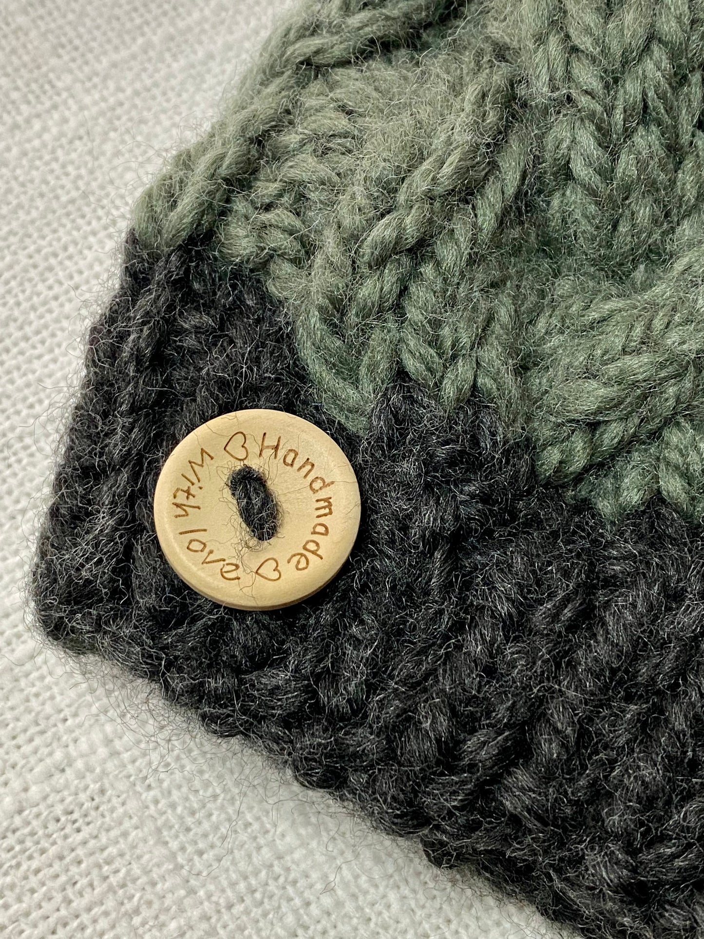 Cozy Cables Hat in Moss and Raven- Recycled Synthetic Fiber be