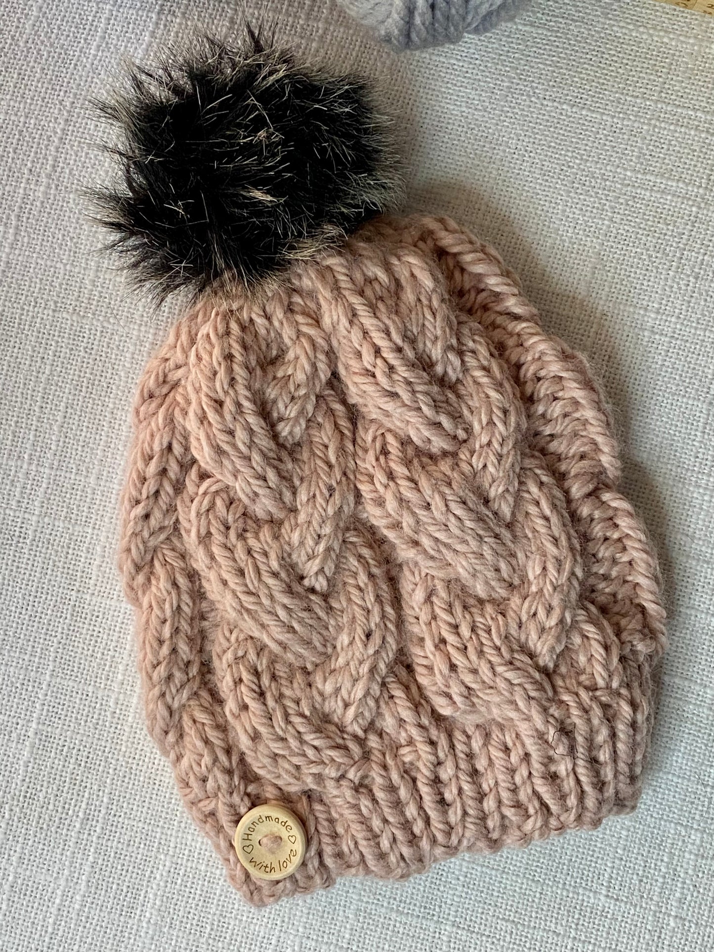 Cozy Cables Hat in Ballet Slipper Pink - Recycled Synthetic Fiber